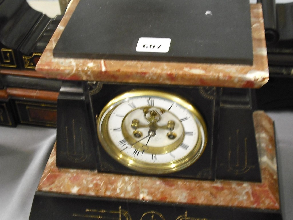 Appraisal: Black slate and red marble two train mantel clock the