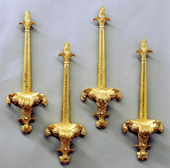 Appraisal: Set of unusual wall-mounted plate stands beaded shaft surmounted with