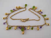 Appraisal: A yellow metal tests carat gold amethyst and peridot necklace