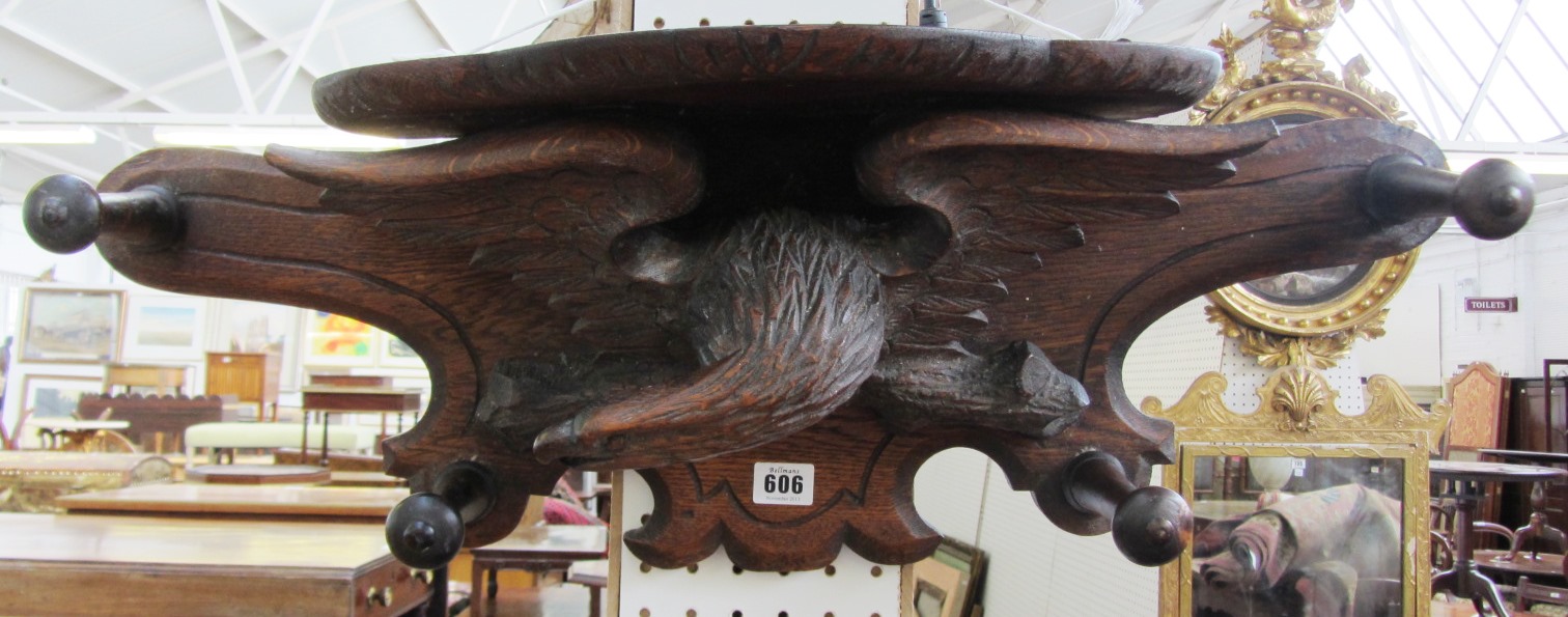 Appraisal: A th century German carved oak coat hook with carved