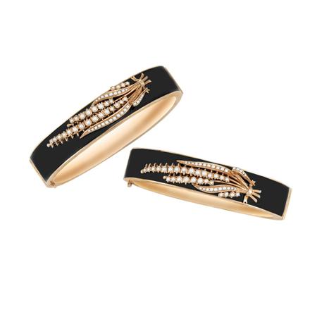 Appraisal: Pair of Antique Gold Black Enamel and Split Pearl Bangle