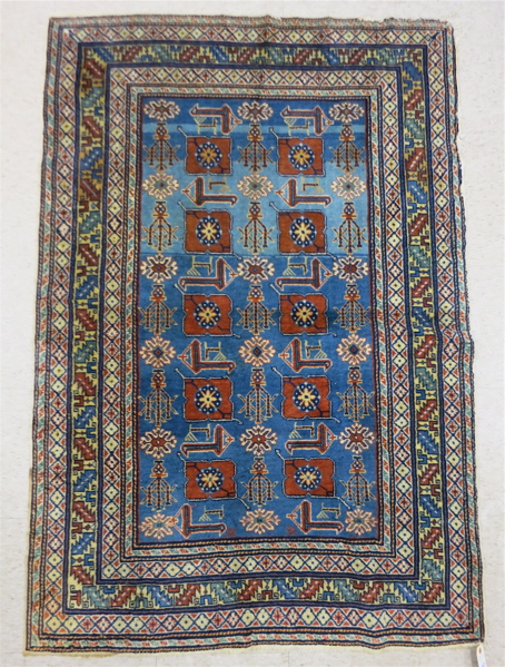 Appraisal: SEMI-ANTIQUE ERABIN CAUCASIAN AREA RUG featuring geometric and curvilinear stylized