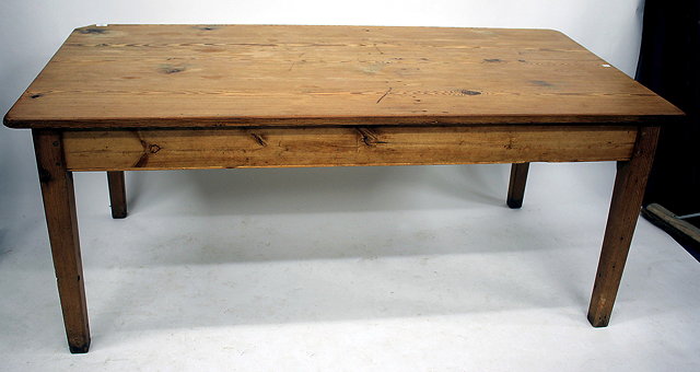 Appraisal: A PINE RECTANGULAR TOPPED KITCHEN TABLE standing on square tapering