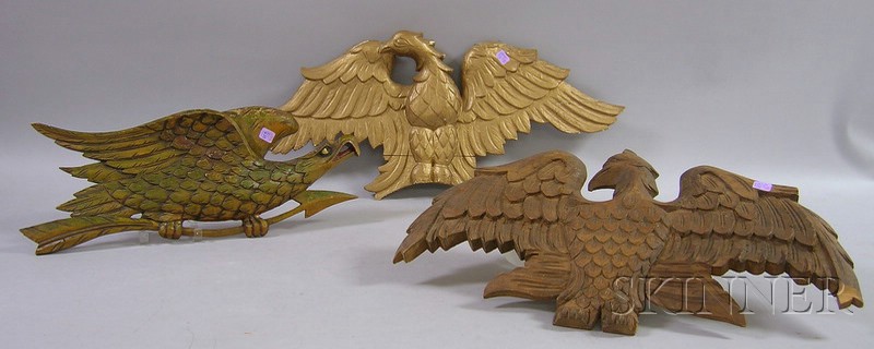 Appraisal: Three Carved Wooden Eagle Plaques one polychrome and one with