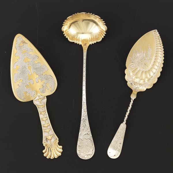 Appraisal: THREE GOLD WASHED STERLING SERVING UTENSILS One ladle with shaped