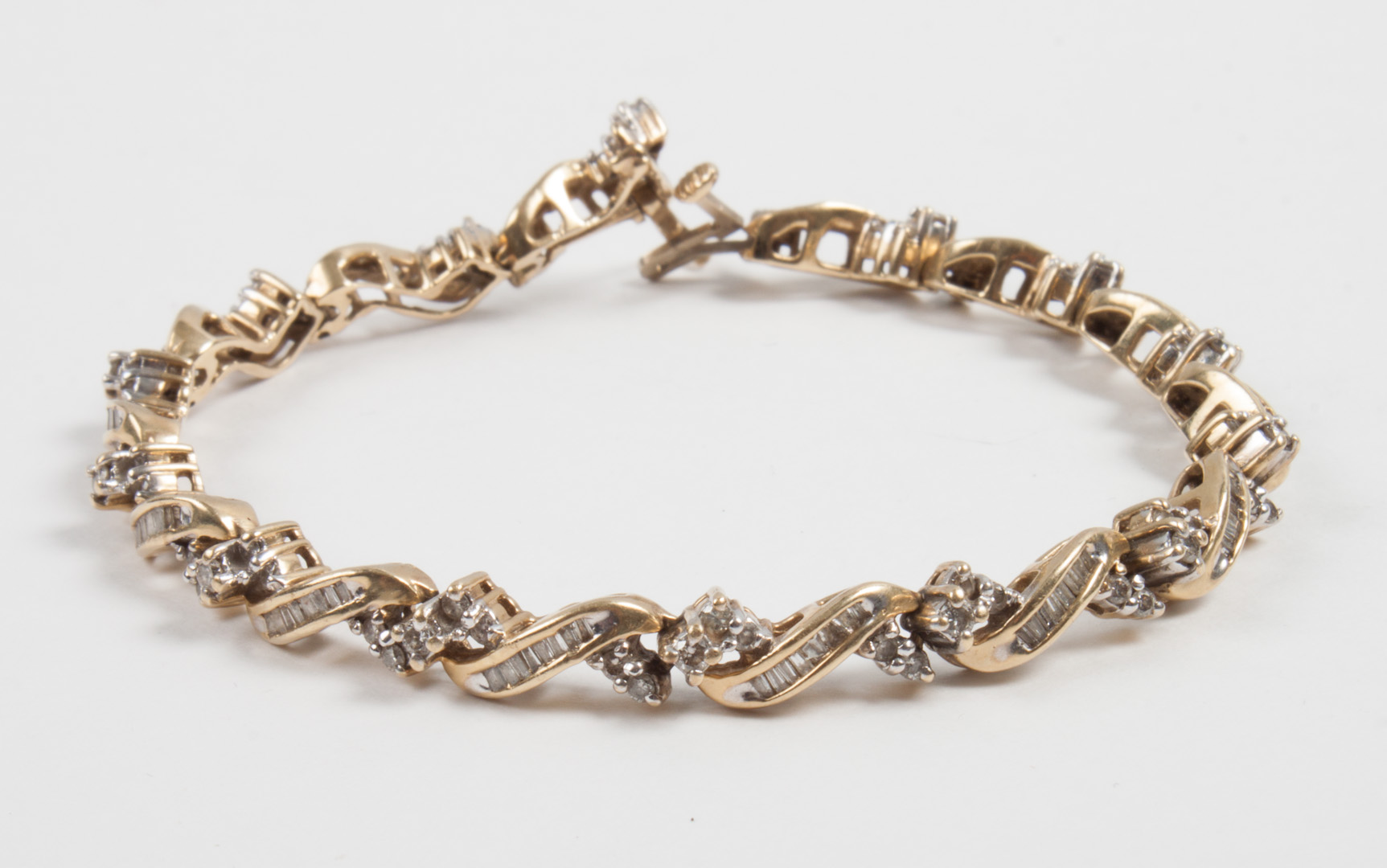 Appraisal: Lady's gold and diamond bracelet marked K in L grams