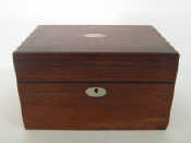 Appraisal: A rosewood jewel box opening to reveal compartments mirror a