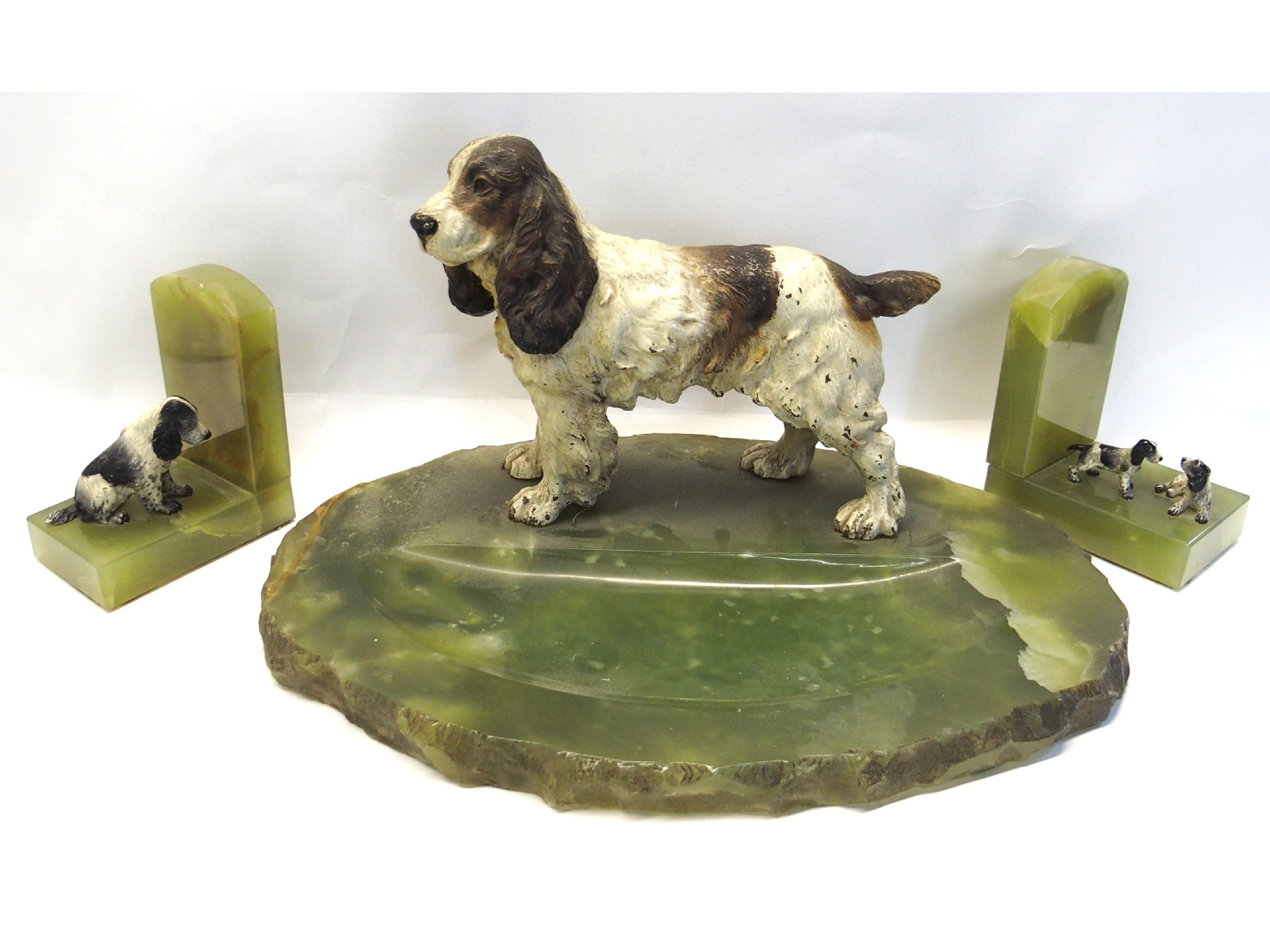 Appraisal: Cold painted Spaniel figure mounted on a green onyx desk