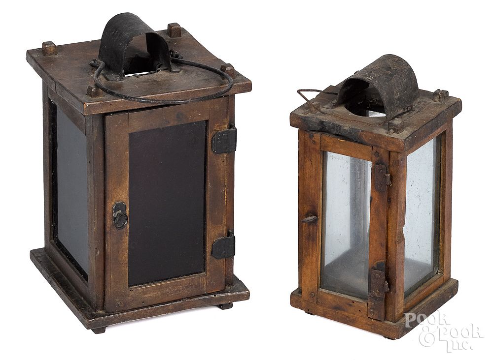 Appraisal: Two primitive wood lanterns th c Two primitive wood lanterns