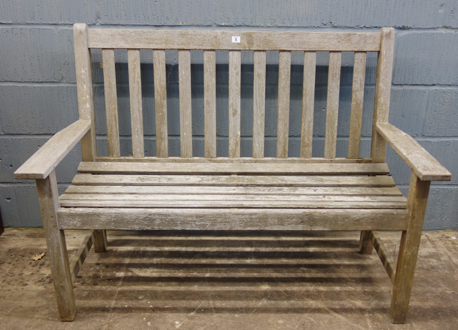 Appraisal: A slatted wooden garden bench seat cm wide