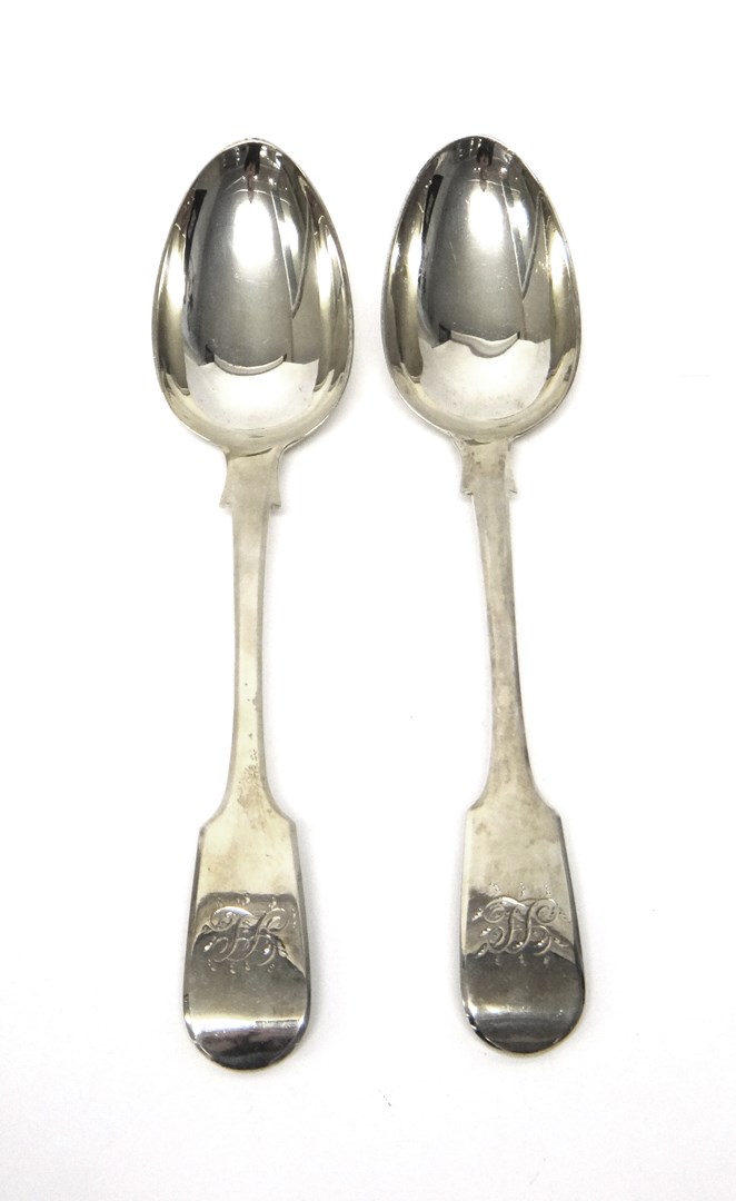 Appraisal: A pair of Victorian silver fiddle pattern tablespoons monogram engraved