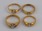 Appraisal: A mixed lot comprising four yellow metal tests carat gold