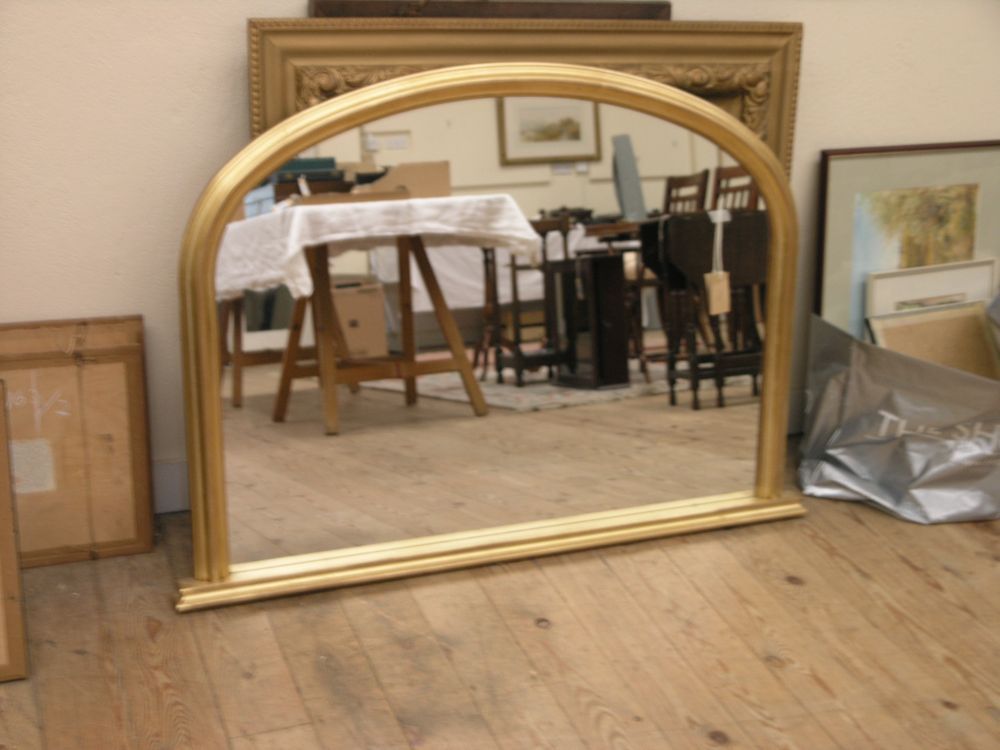 Appraisal: A Victorian style gilt overmantel domed shape ft in