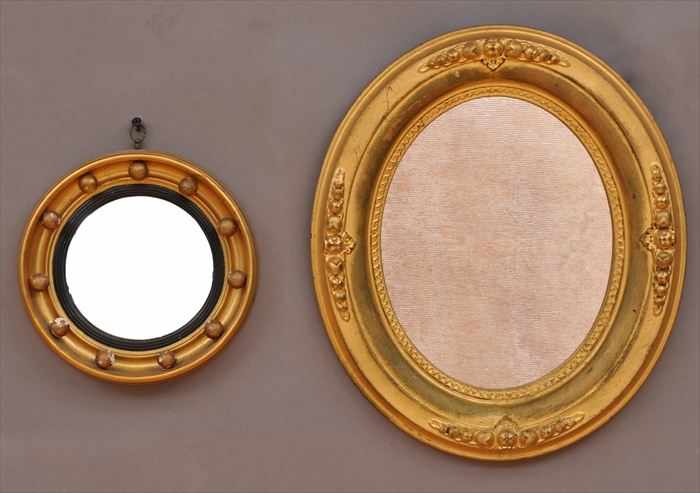 Appraisal: VICTORIAN GILTWOOD OVAL WALL MIRROR Together with a diminutive Regency-style