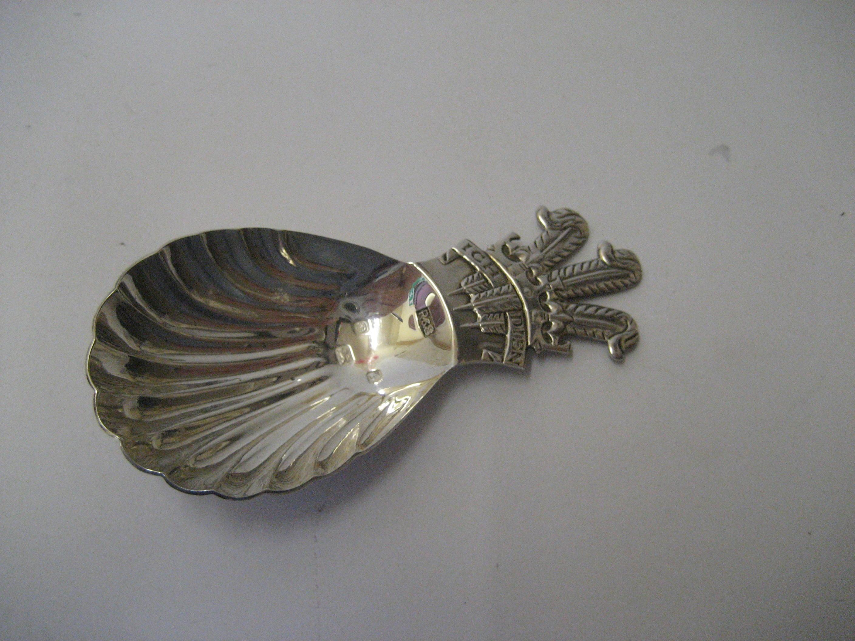 Appraisal: A SILVER CADDY SPOON makers Roberts Belk Sheffield with fluted