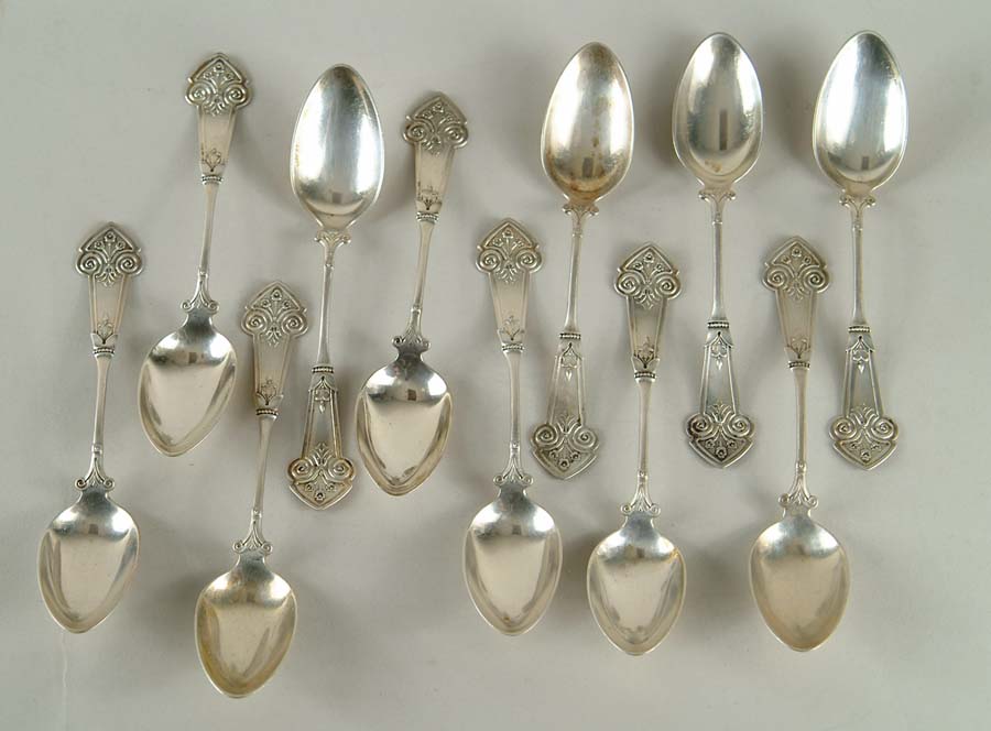 Appraisal: SET OF ELEVEN FANCY COIN SILVER TEASPOONS Monogrammed SIZE CONDITION