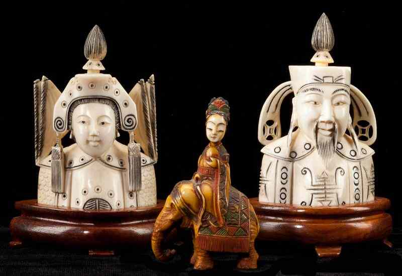 Appraisal: Three Chinese Ivory Snuff Bottlesa pair of busts representing the