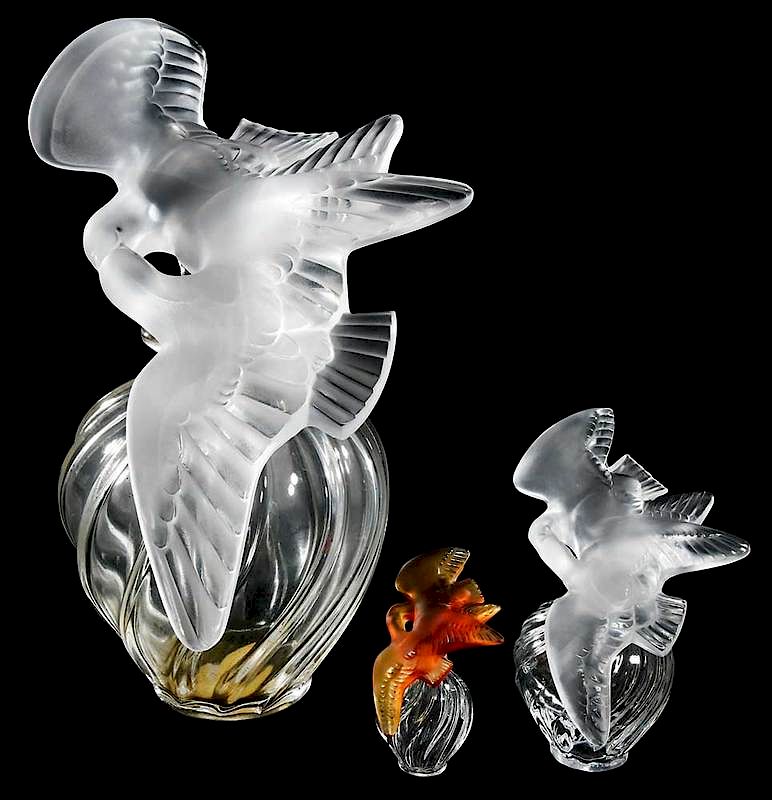 Appraisal: Three Lalique Nina Ricci Lovebird Perfumes engraved on side Lalique