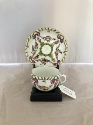 Appraisal: A Kloster Veilsdorf teacup and saucer circa painted to the