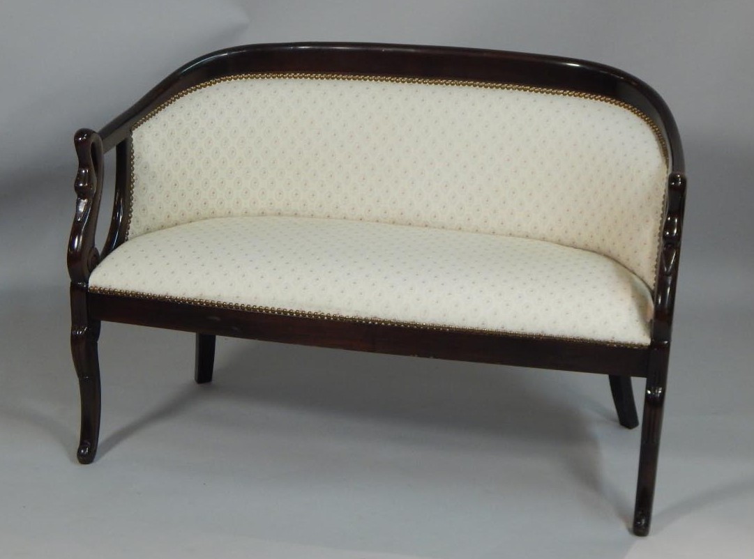 Appraisal: A Continental style two seater sofa with a padded back