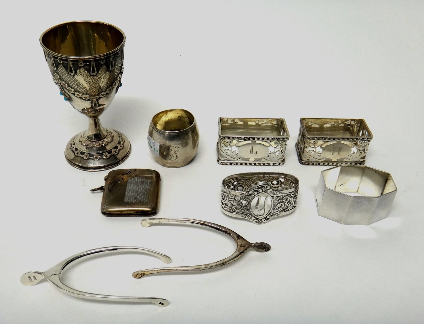 Appraisal: Silver comprising a pair of rectangular napkin rings with pierced