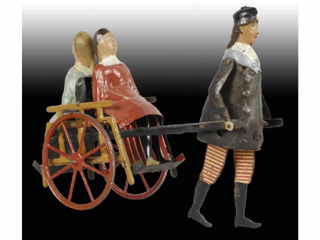 Appraisal: French Martin Man Pulling Women in Cart Toy Description Tin