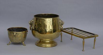 Appraisal: TWO BRASS BOWLS AND A TRIVET The larger with hammered