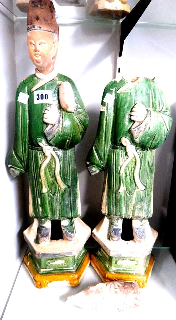 Appraisal: A pair of Chinese pottery tomb figures Ming Dynasty each