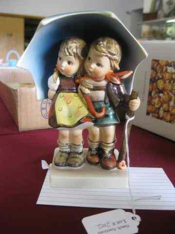 Appraisal: Hummel Figurine ''Stormy Weather'' Goebel bee excellent