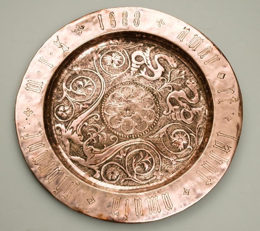 Appraisal: ARTS CRAFTS COPPER CHARGER circular the well chased with four