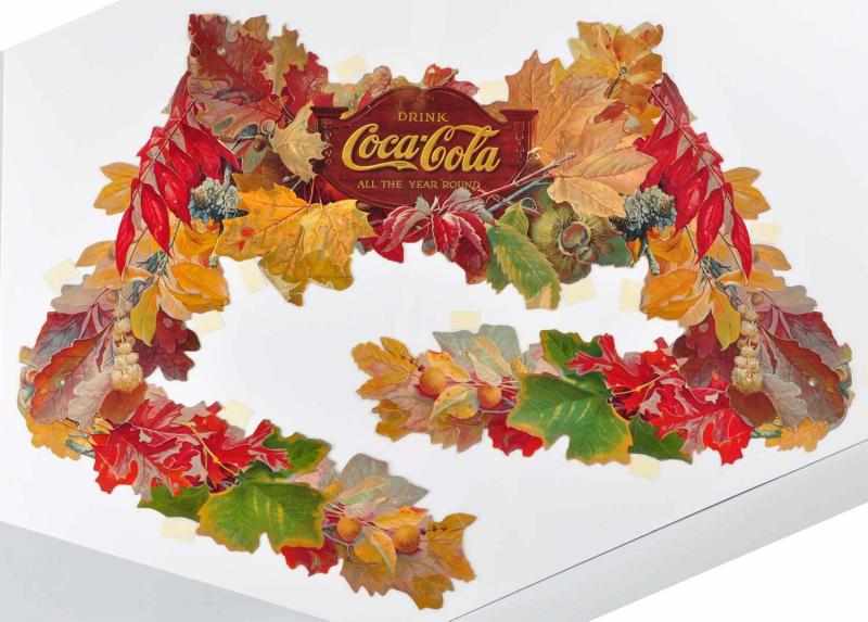 Appraisal: Coca-Cola Autumn Leaves Festoon Description Closed tear on bottom center