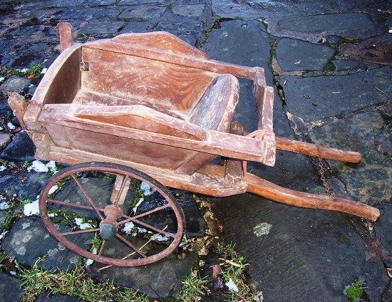 Appraisal: A child's cart the metal wheels with rubber rims cm