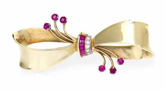 Appraisal: A Karat Yellow Gold Ruby and Diamond Bow Brooch containing