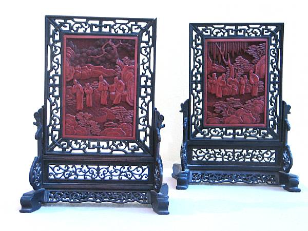 Appraisal: A pair of cinnabar lacquer rectangular plaques Set in reticulated