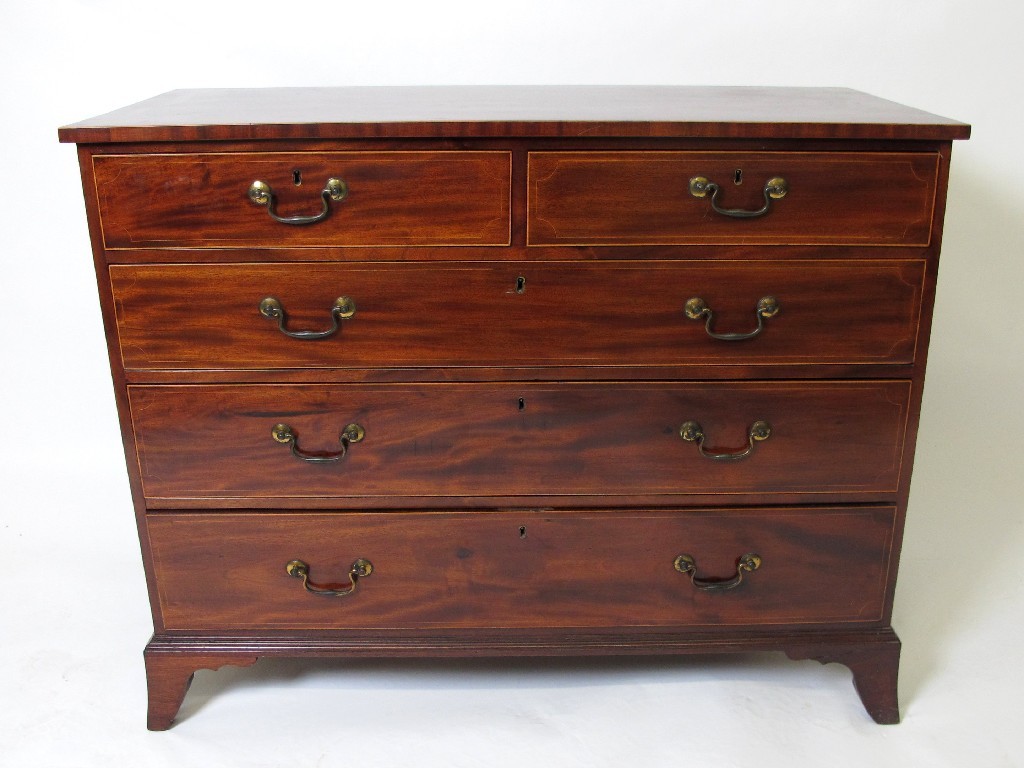 Appraisal: A George III mahogany inlaid chest of drawers with two