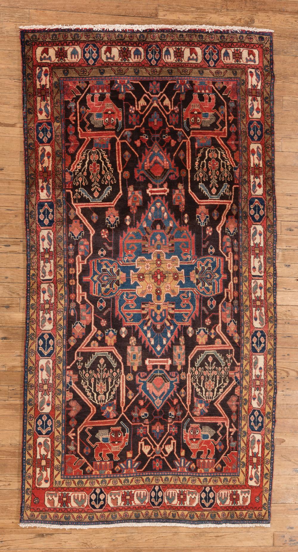 Appraisal: Persian Malayer Carpet repeating motifs of lions and florals ft