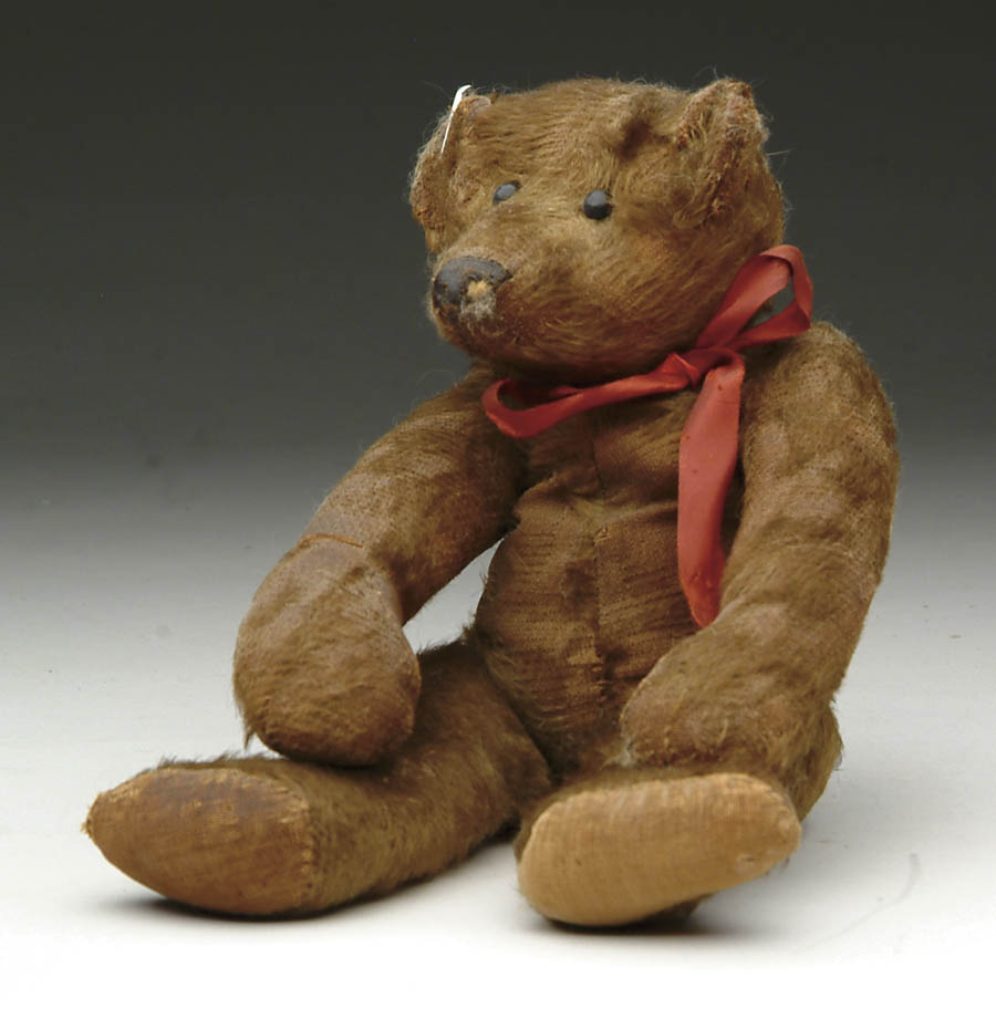 Appraisal: EARLY LONG-ARMED JOINTED TEDDY BEAR Early jointed mohair teddy bear