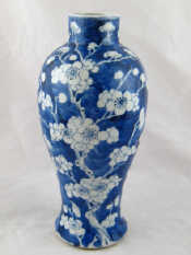 Appraisal: A th c blue and white vase with prunus decoration