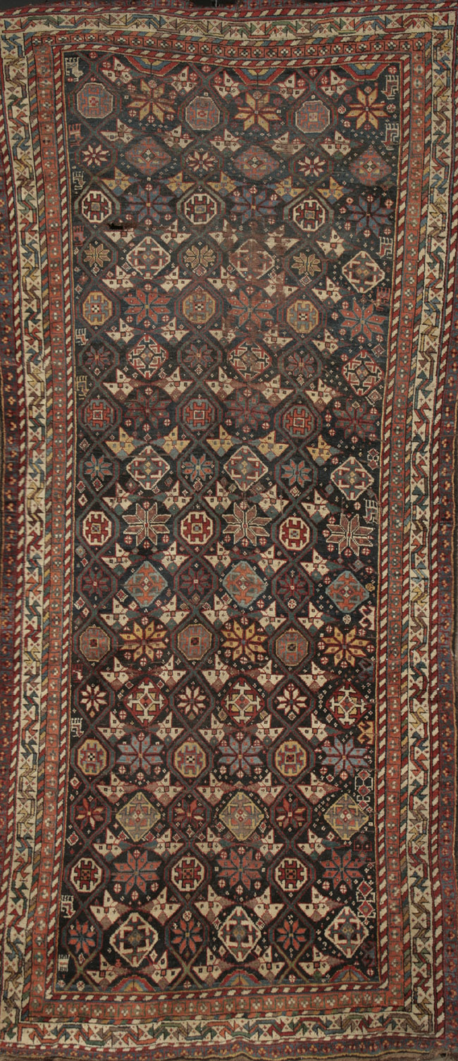 Appraisal: Caucasian Corridor Rug First Quarter th Century Blue ground with