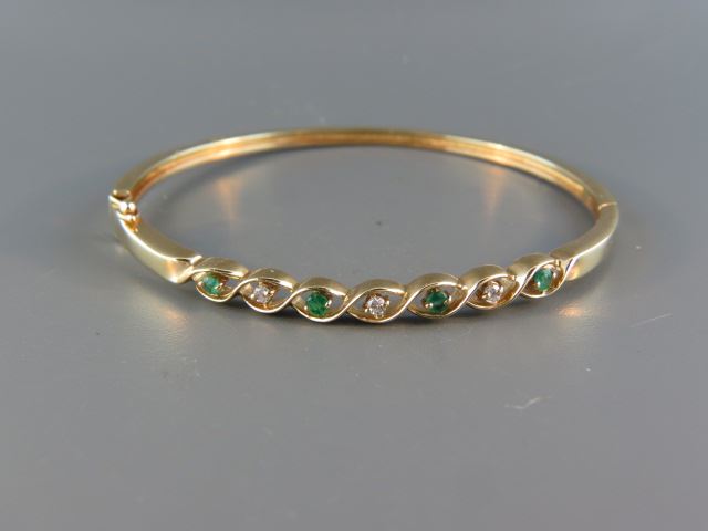 Appraisal: Emerald Diamond Bangle Bracelet round emeralds and round diamonds in