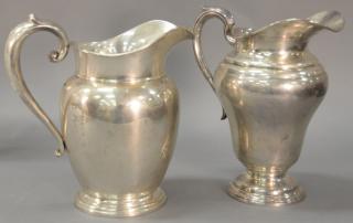 Appraisal: Two sterling silver water pitchers ht t oz Two sterling