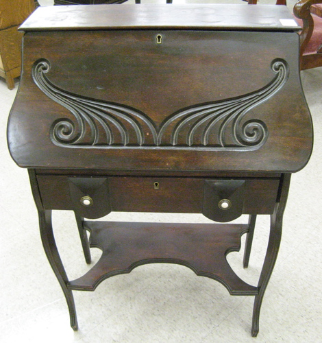 Appraisal: LATE VICTORIAN WRITING DESK have a slant front the falls