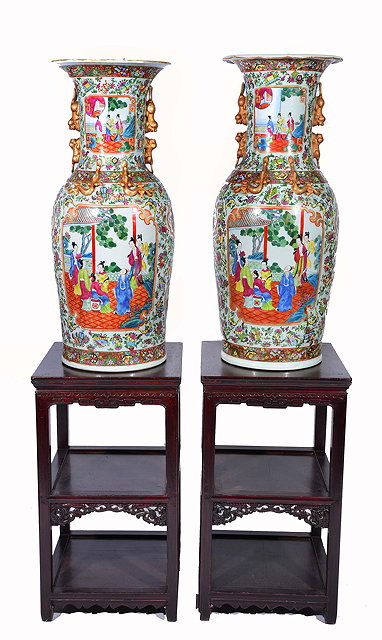 Appraisal: A PAIR OF CHINESE HARDWOOD TWO TIER OCCASIONAL TABLES AND