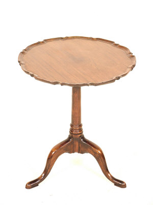 Appraisal: A George III mahogany tripod table the pie crust moulded