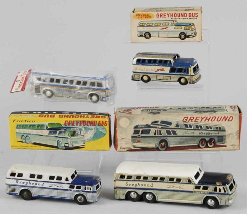 Appraisal: Lot of Tin Greyhound Bus Friction Toys Description Japanese Working