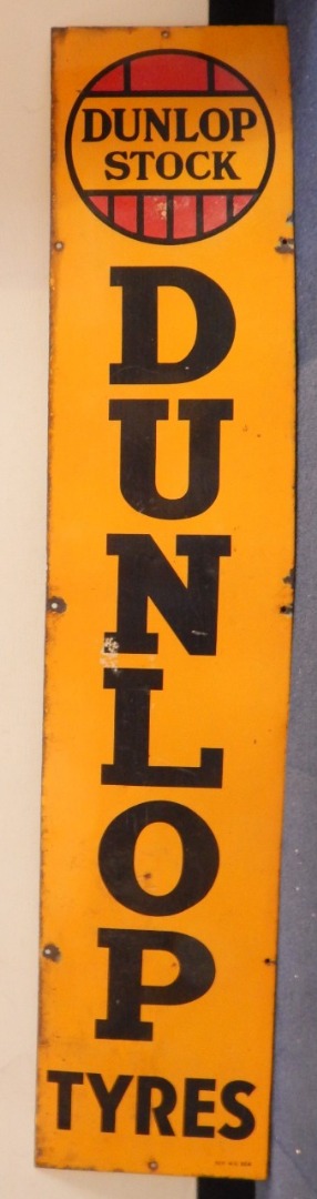 Appraisal: A Dunlop Tyres enamel sign Dunlop Stock in red yellow