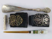 Appraisal: A mixed lot comprising a silver needle case a silver