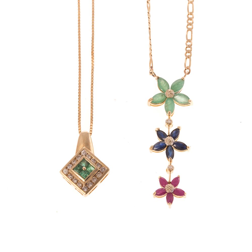 Appraisal: Two Gemstone Diamond Pendants in Gold K yellow gold flower