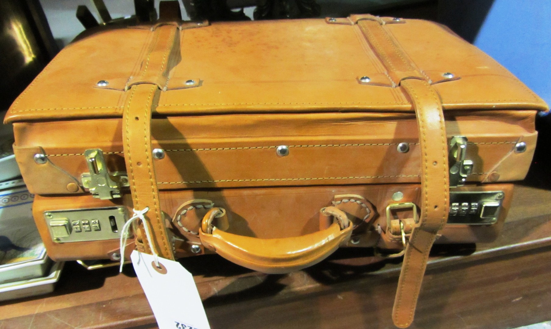 Appraisal: A th century brown leather small suitcase briefcase