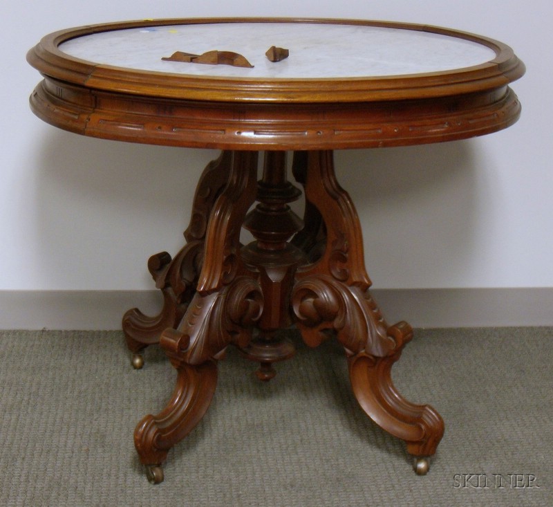 Appraisal: Victorian Renaissance Revival Oval White Marble-top Carved Walnut Center Table